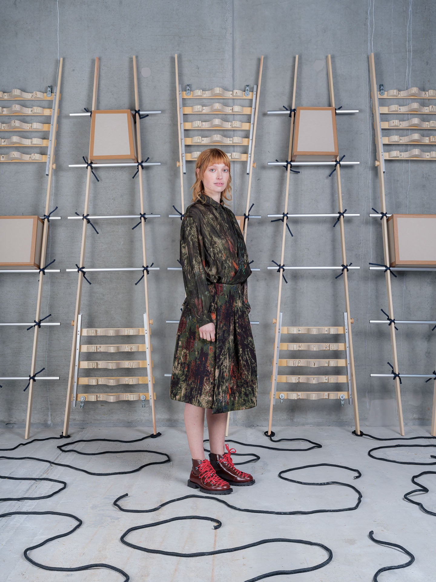 Model wearing Henrik Vibskov Carry Skirt in Gobelin Swamp side view