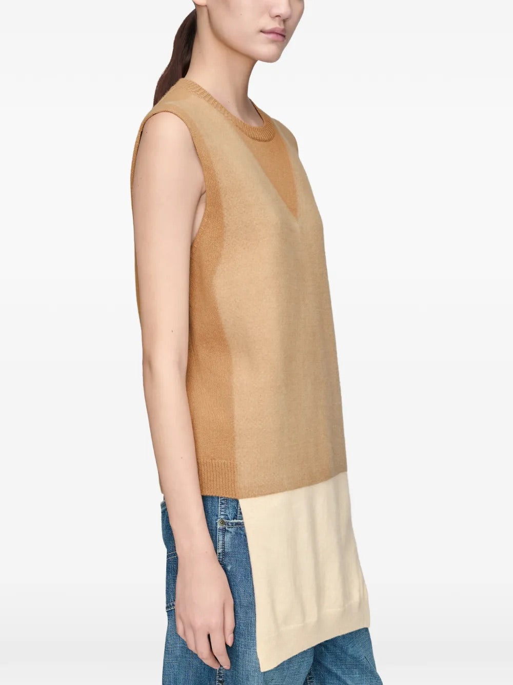 Model wearing Maison Margiela Fuse Knit Vest in Camel/Ecru, side view.