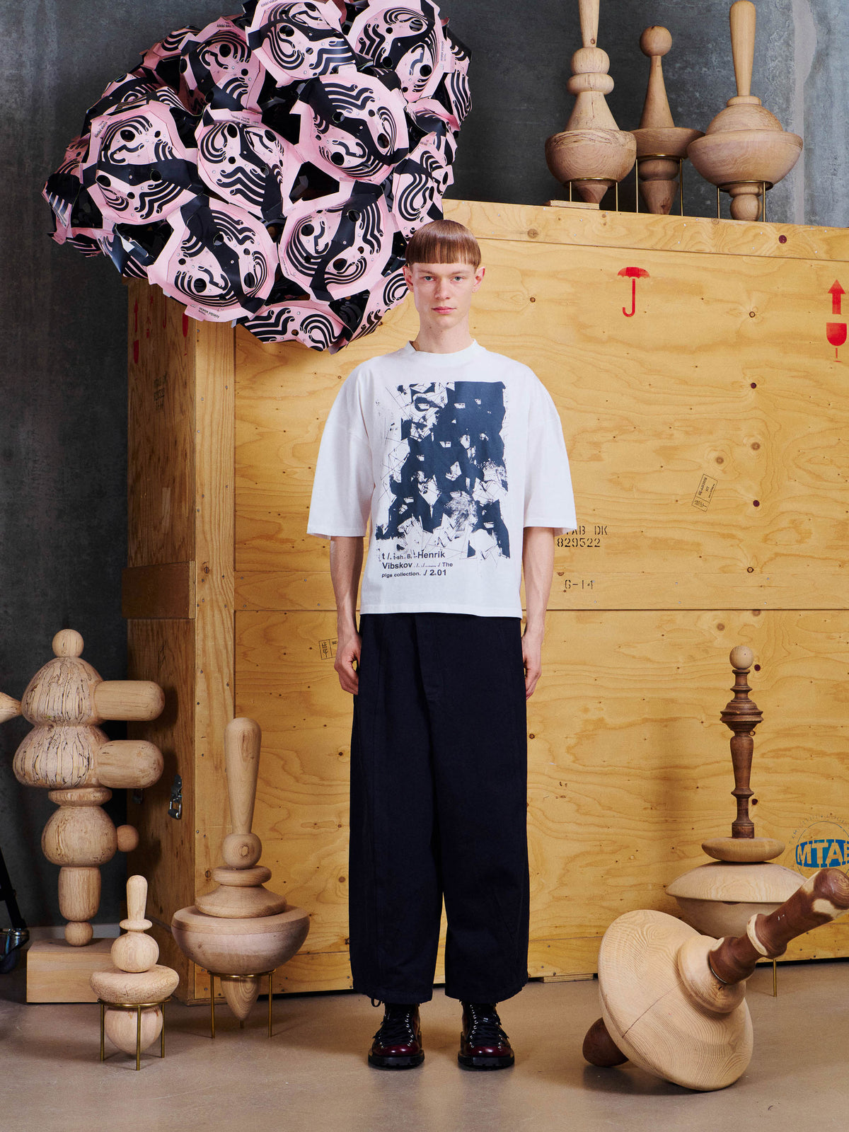 Model wearing the Henrik Vibskov Punk Graduation Tee in Cloud from the front, showing the oversized fit, dropped shoulders and large graphic print.
