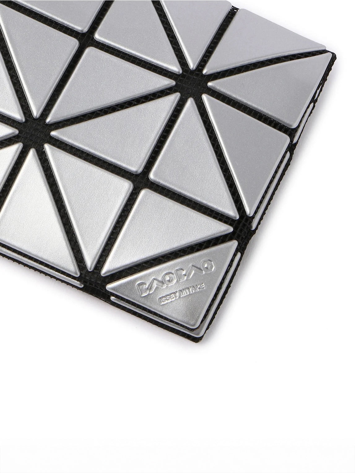 Close-up of the Bao Bao Issey Miyake August AW26 Card Case in Silver showing geometric panels and embossed logo