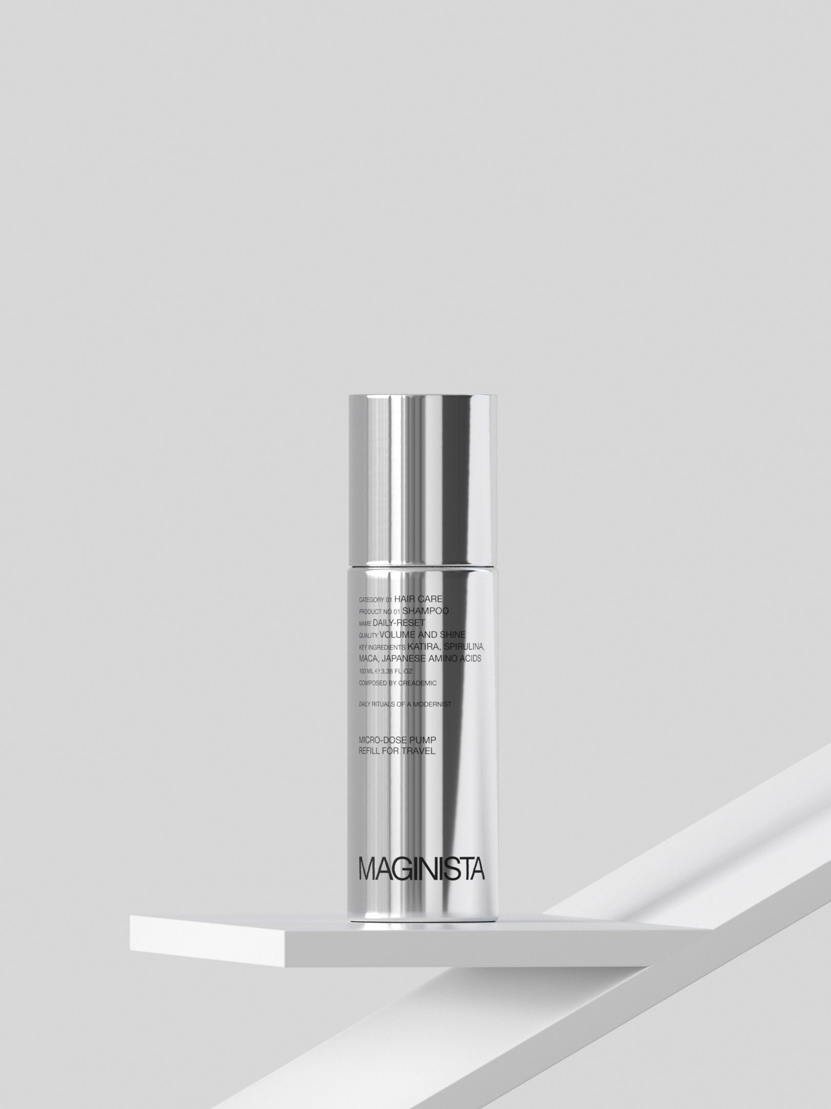 Shampoo bottle with 'MAGINISTA' branding on a light gray background