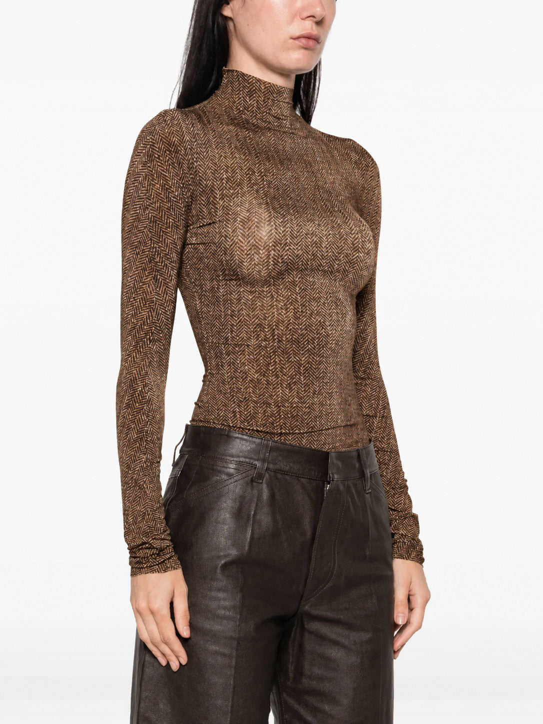 Model wearing the Maison Margiela Printed Herringbone Bodysuit in Brown, showing the fitted silhouette and high neckline.