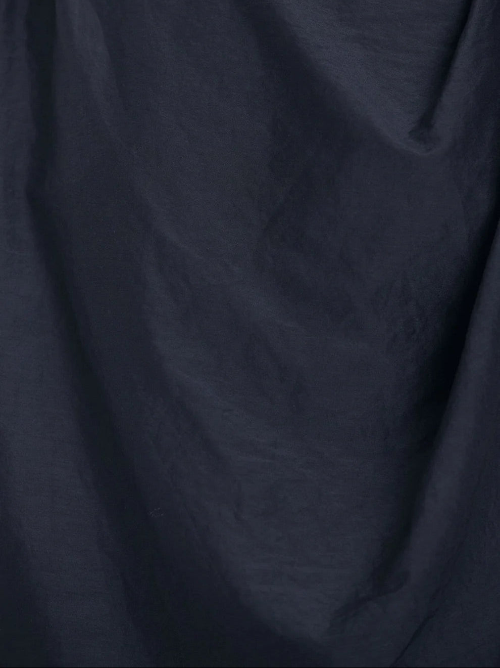 Black Crane Mont Blanc Dress in Faded Black - detail view showing silk cotton woven fabric texture