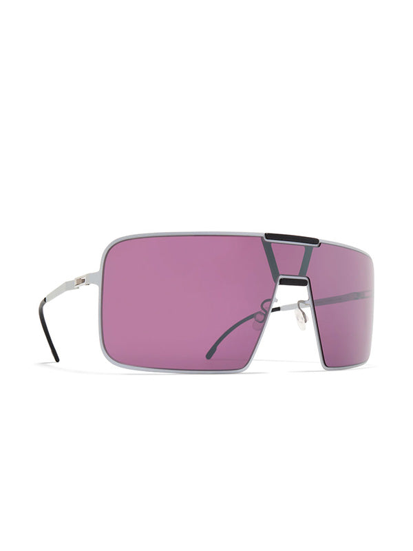 Mykita x Rimowa Navigator Sunshield MR004 white mulberry, three-quarter angle revealing the wraparound shield lens depth, slim silver temple arms, and black rubber temple tips