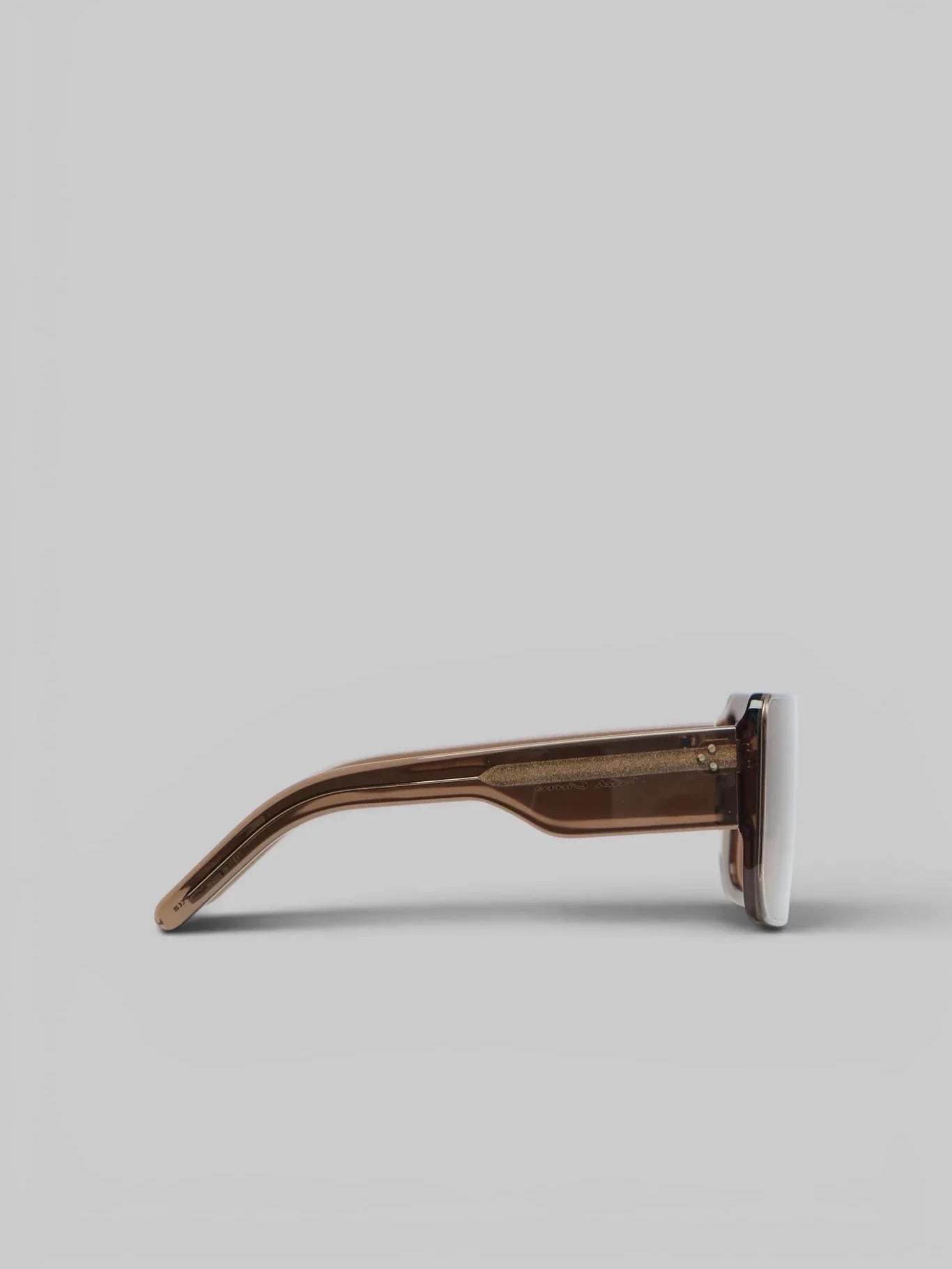 Side view of Rick Owens DRKSHDW Documenta Sunglasses showing tobacco brown acetate temple, wide hinge and oversized rectangular frame shape