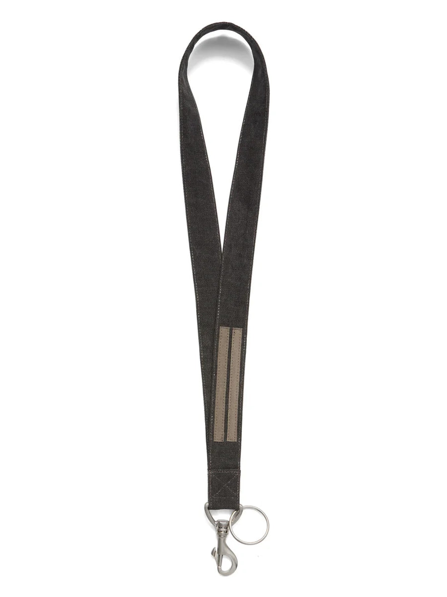 Rick Owens Neckhook in Gravel/Pearl shown from the reverse with stripe detailing, silver-tone snap clip and round keyring.
