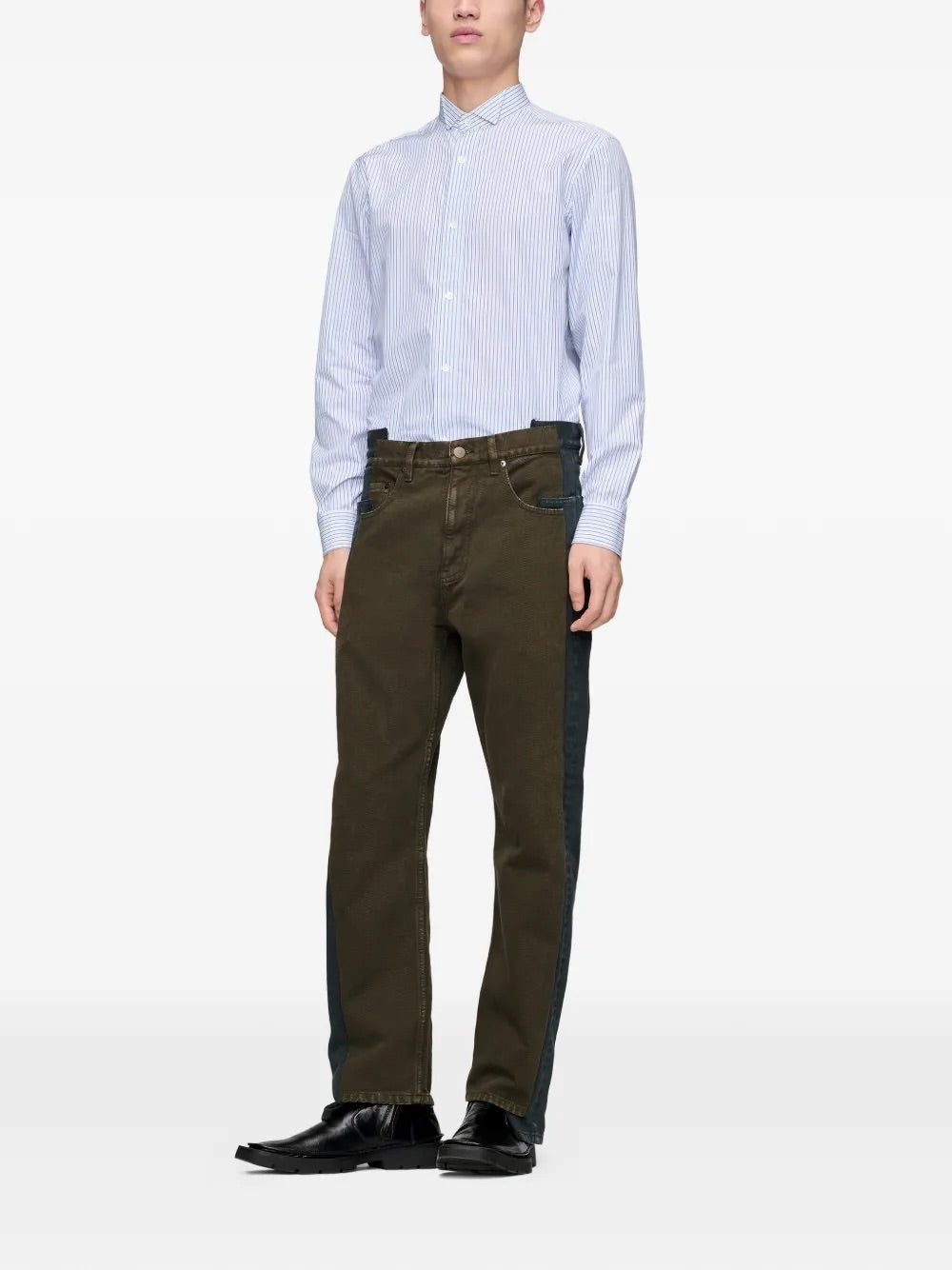 Model wearing Maison Margiela Spliced Trousers in Black + Brown