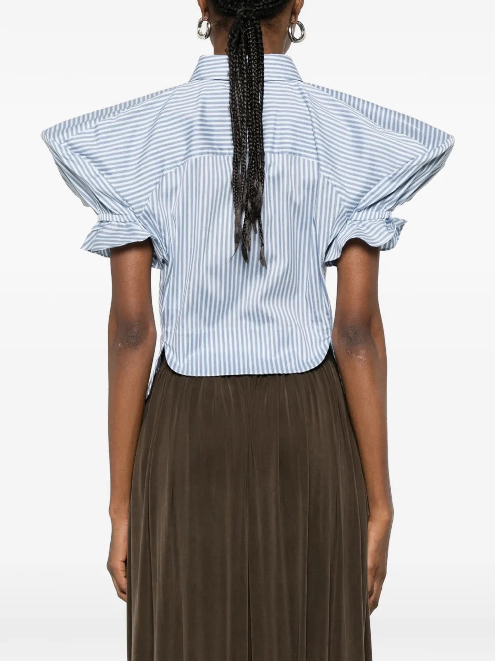 Model wearing Gexy Top in Blue/White by Vivienne Westwood, back view of blue and white striped top with gathered short sleeves and relaxed silhouette, Spring/Summer 2026