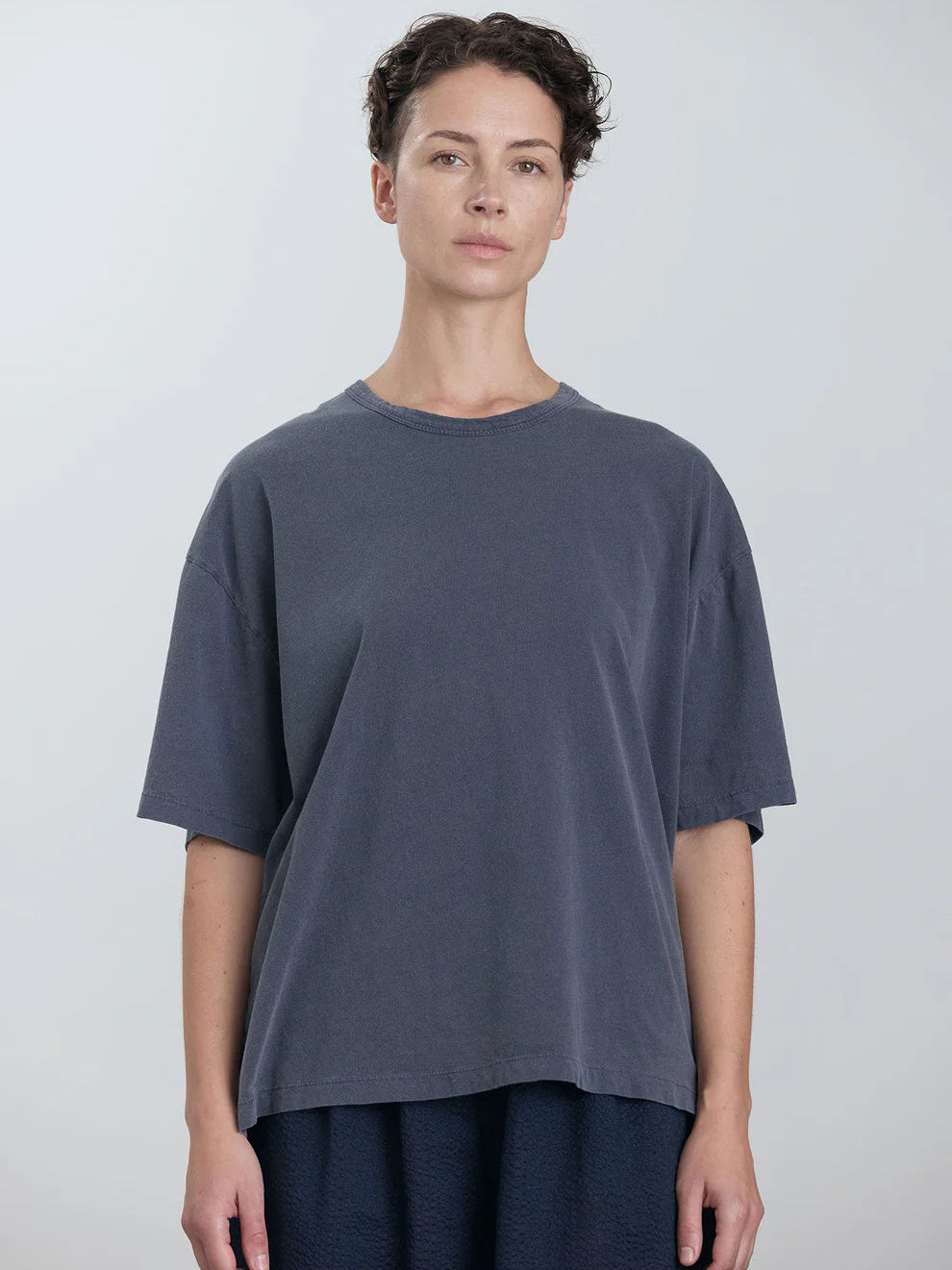 Black Crane Wide Short Sleeve Tee in Indigo - front view on model showing crew neck and boxy shape