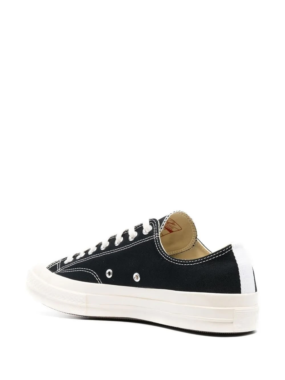 Comme des Garçons Play x Converse Chuck 70 low-top sneakers in black, back and heel view, plain black canvas upper with off-white midsole and metal eyelet detail