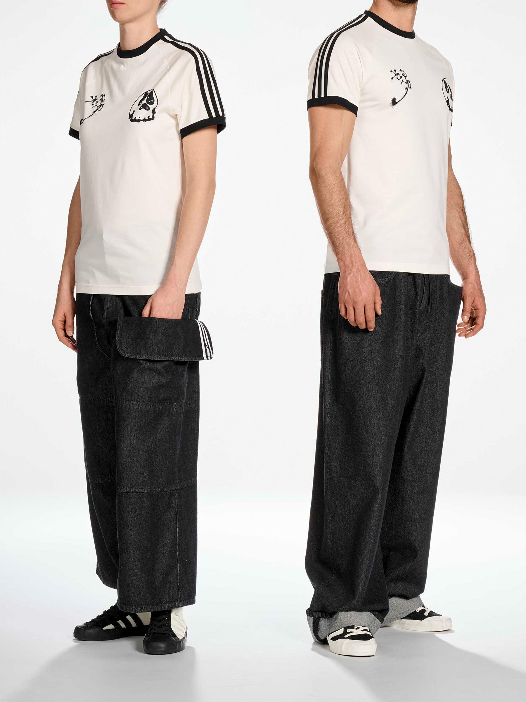 Y-3 Graphic Cali Short Sleeve Tee in Core White - side view on model showing relaxed fit and contrast 3-Stripes at shoulder