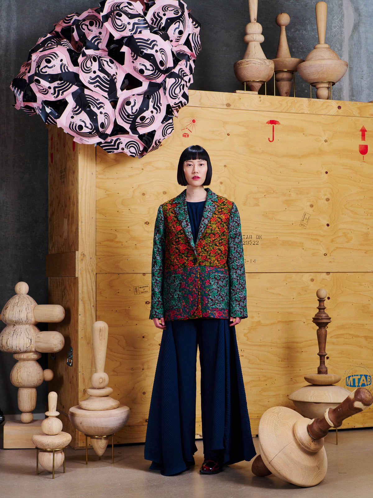 Henrik Vibskov Always Blazer in Floral Affairs styled on model, showing relaxed tailored fit, front patch pockets and all-over floral patchwork pattern. ID: ARCHIVE-F612