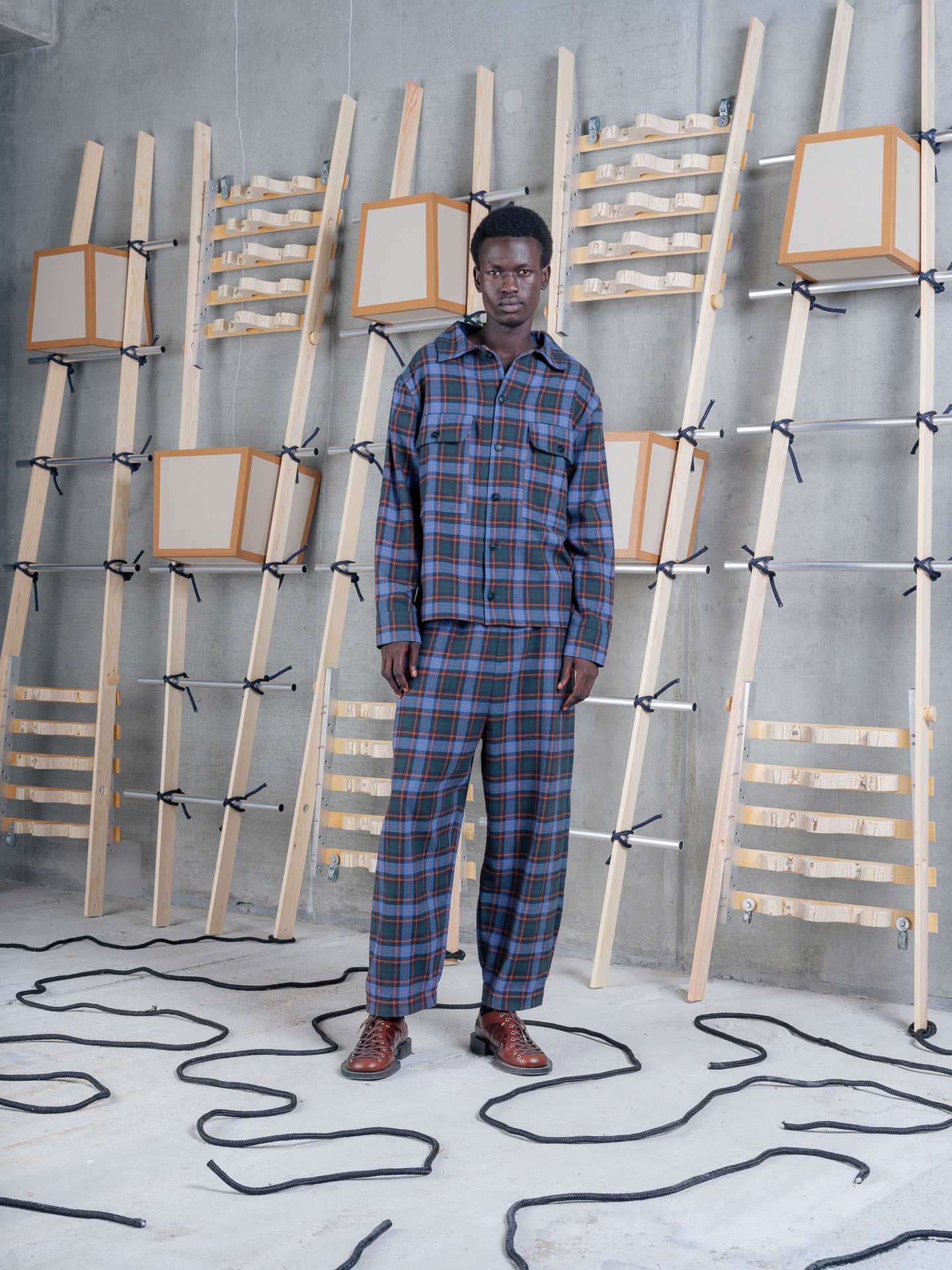 Henrik Vibskov Field Shirt Blue Flannel Checks, model front view, styled as a co-ord with matching Field Pants