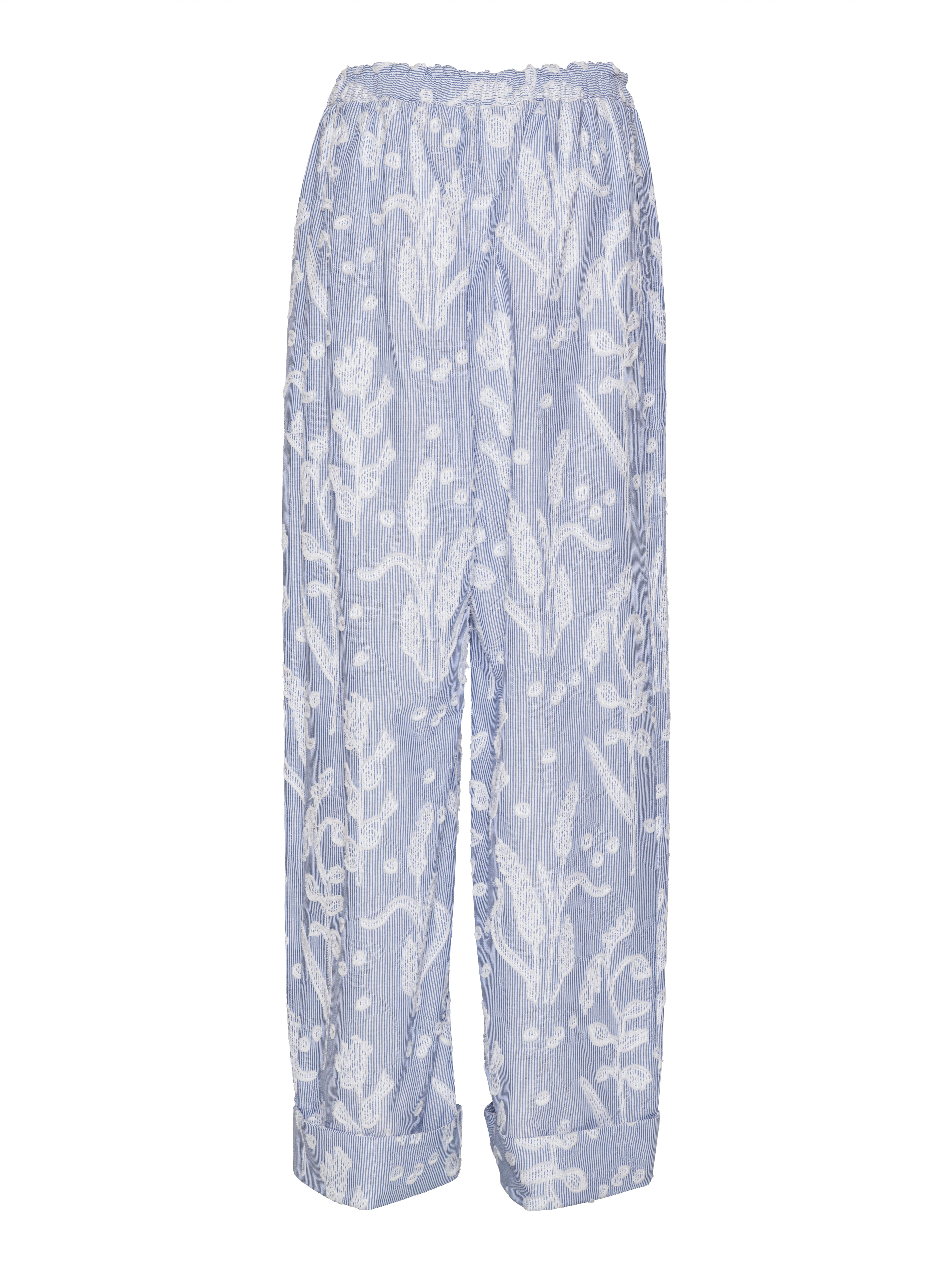 Back view of the Helmet Pants highlighting wide-leg silhouette and side pockets.