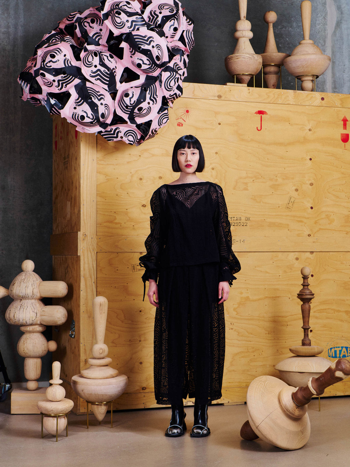 Henrik Vibskov Long Delivery Dress in Dark Stormy Sea styled on model from the front, showing semi sheer abstract pattern and layered long silhouette. ID: ARCHIVE-F311