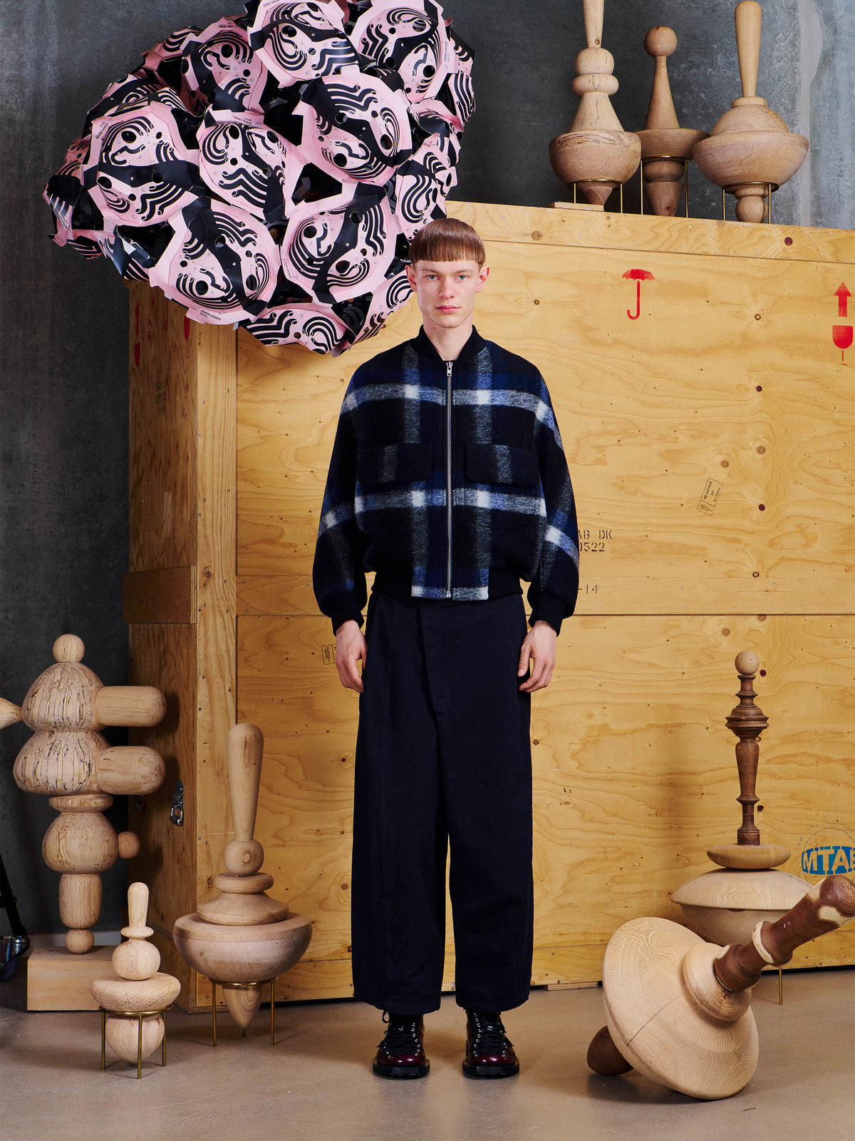 Male model wearing Henrik Vibskov Merry Bomber from the front, showing the relaxed bomber silhouette and voluminous sleeves.