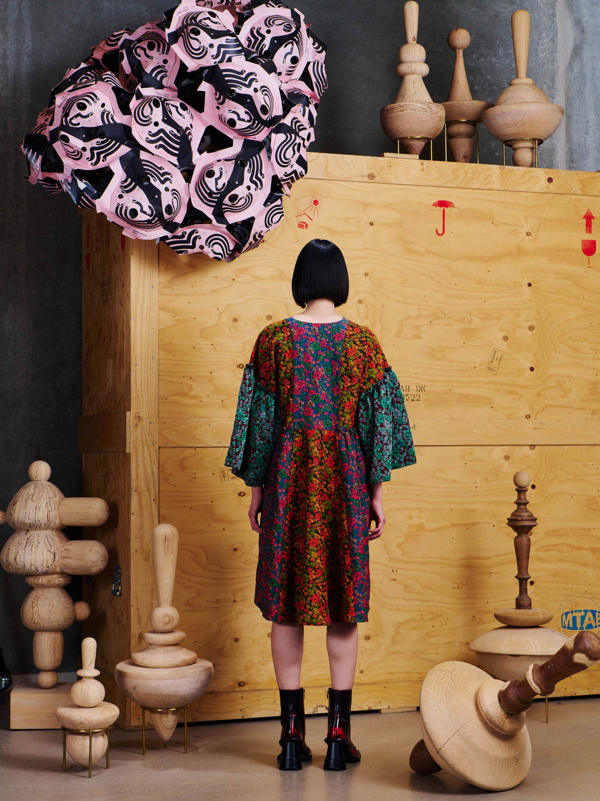 Back view of model wearing the Henrik Vibskov Pumpkin Dress in Floral Affairs, showing the contrasting floral panels and relaxed silhouette.