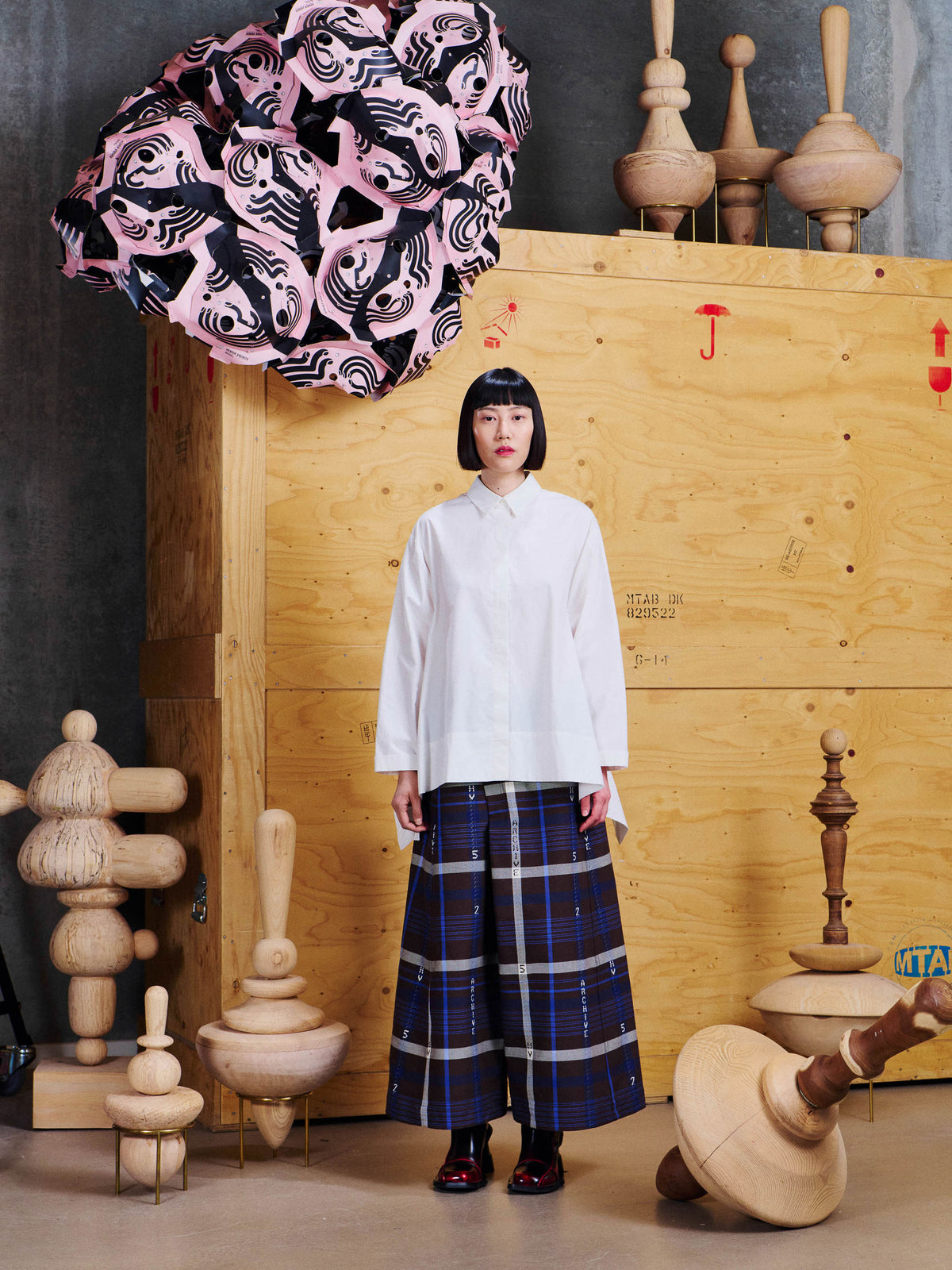 Henrik Vibskov Wind In Blouse in White worn front view, showing the oversized fit, classic collar and clean buttoned front.