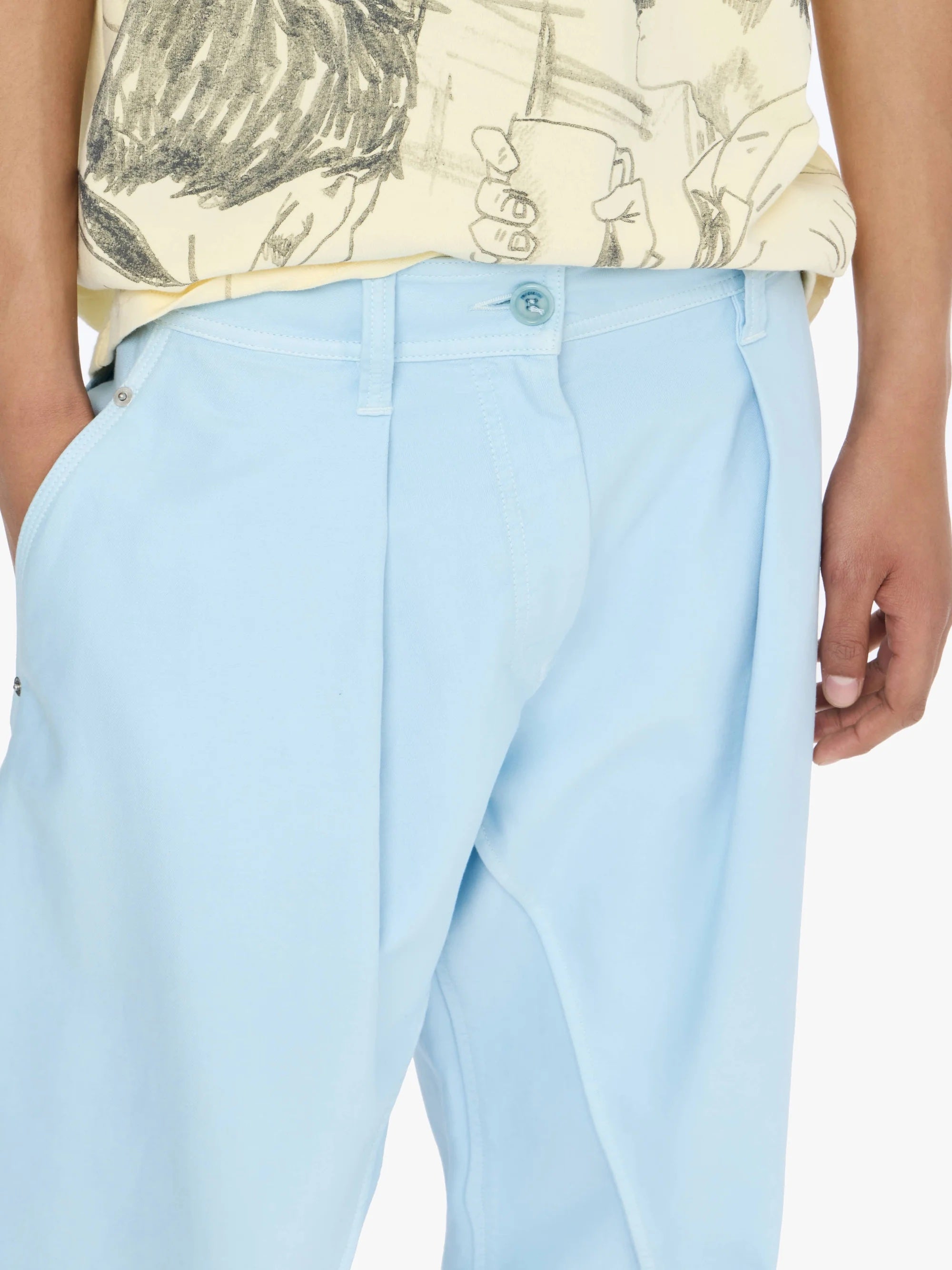 Light blue pants worn by a person with a neutral background