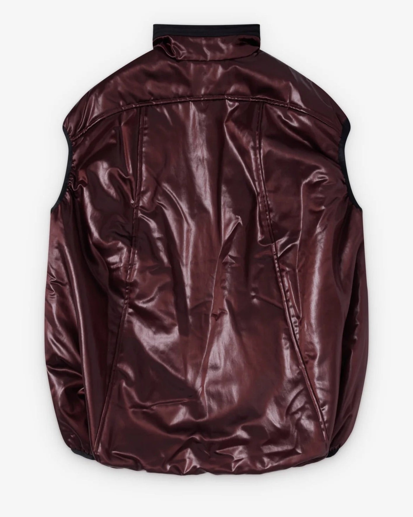 Back view of Kiko Kostadinov Auk Pullover Gilet in Burnt Umber showing sleeveless silhouette, glossy technical fabric and black trim detailing