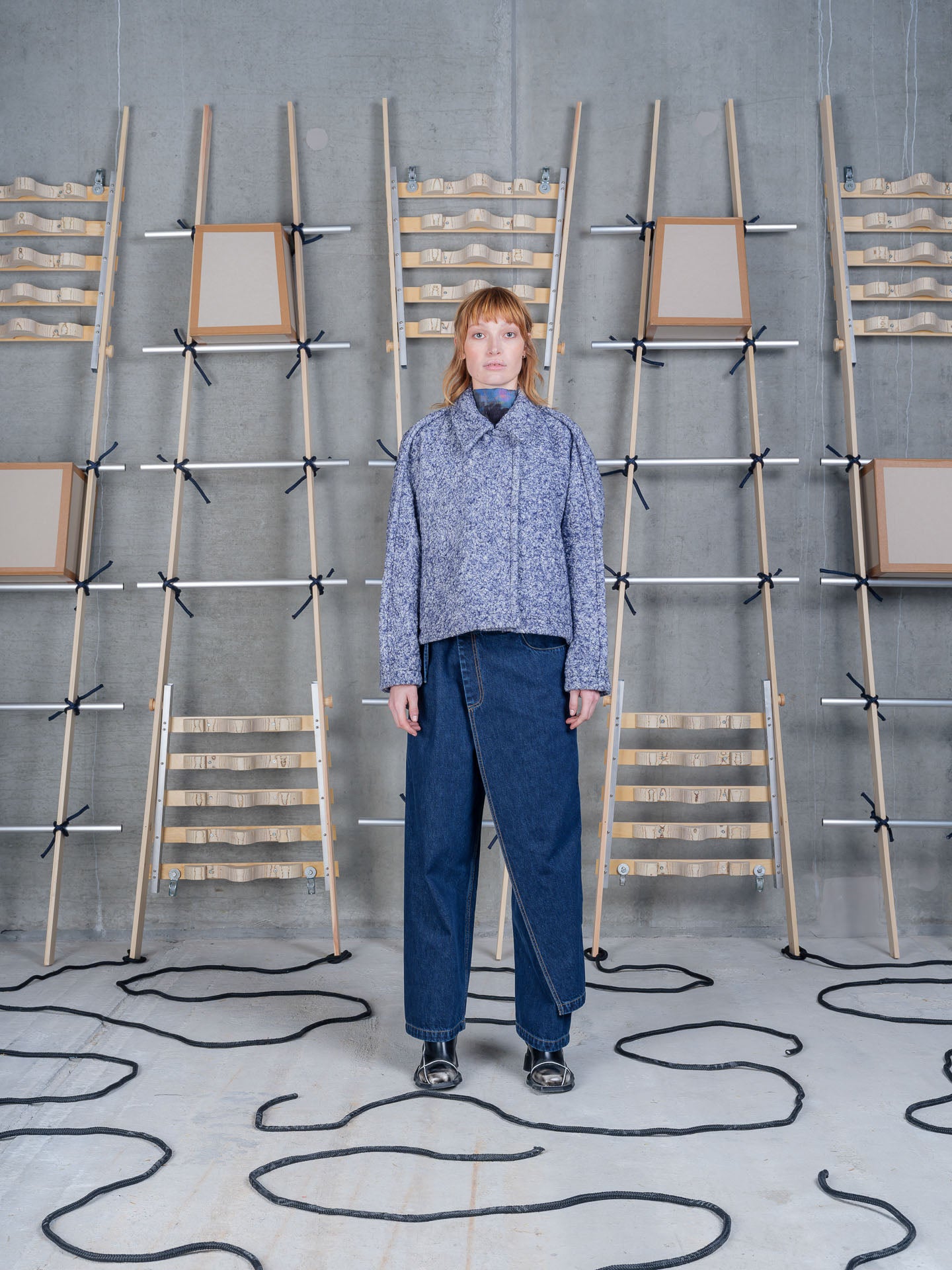 Model wearing Relaxed Dartbi Jacket in Blue Pebbles by Henrik Vibskov front view
