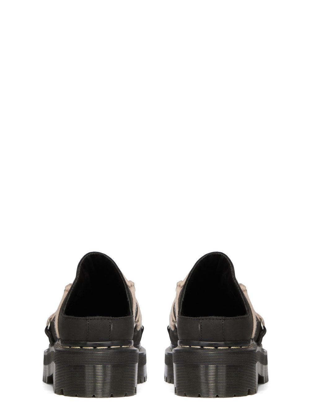 Rear view of Rick Owens x Dr. Martens black mule pair showing the open-back construction and chunky soles.