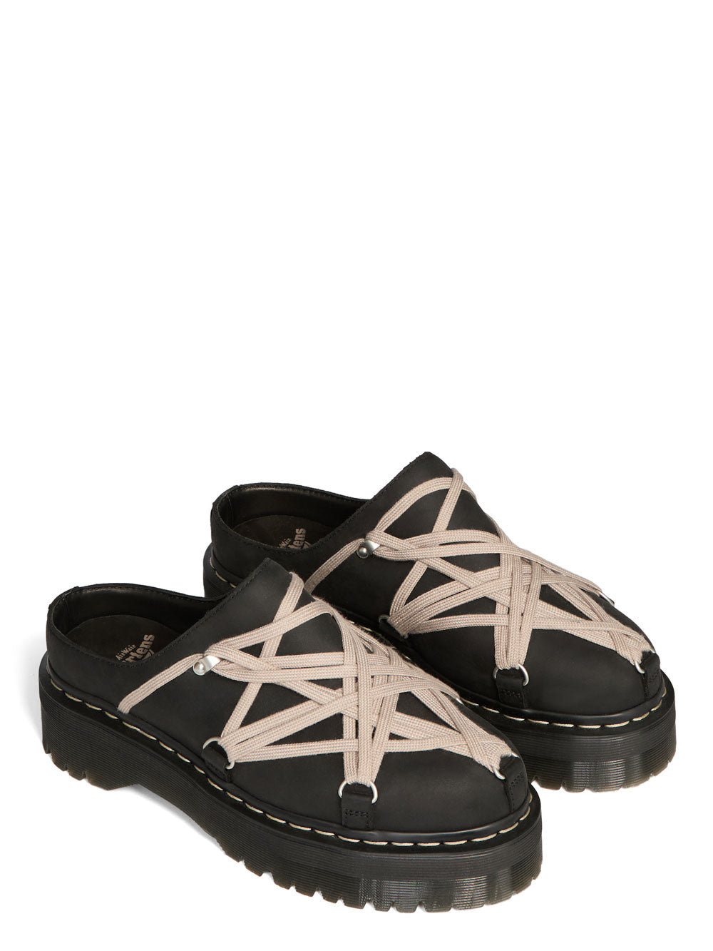 Angled view of Rick Owens x Dr. Martens black Megalace® mules with pearl lacing, metal hardware and platform soles.