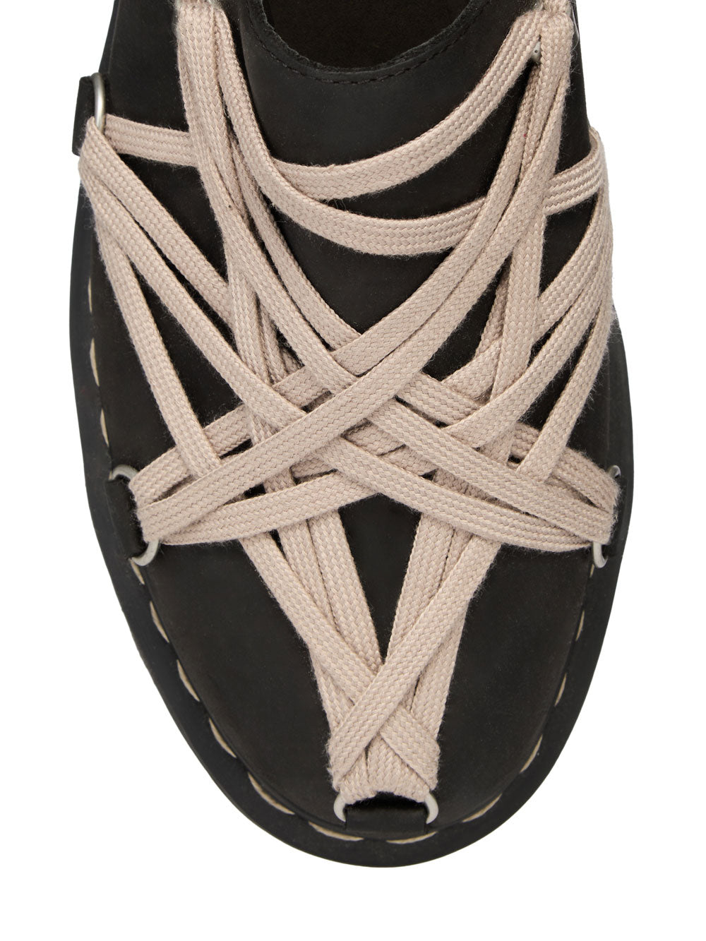 Close-up of pearl Megalace® lacing and metal hardware across the black nubuck upper of the Rick Owens x Dr. Martens mule.