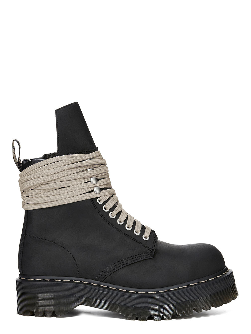 Rick Owens x Dr. Martens FW26 black lace-up boot in side view with oversized grey laces, chunky sole and pull tab.
