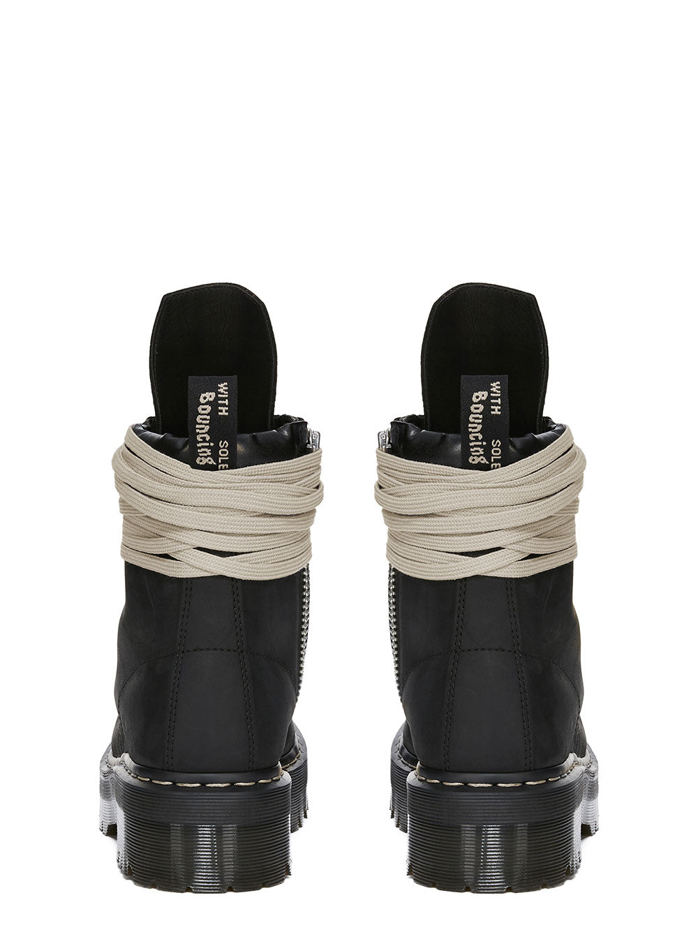 Rick Owens x Dr. Martens FW26 black lace-up boots in back view with pull tabs, heel detailing and chunky sole.