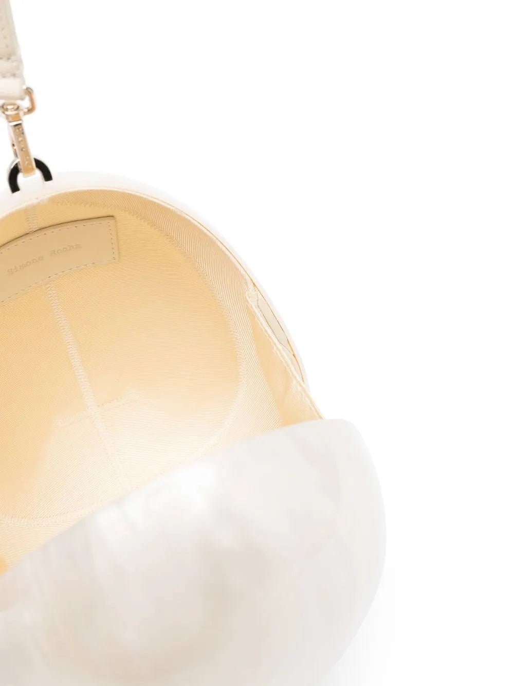 Interior view of the Large Pearl Crossbody Egg Bag opened, showing the structured compartment and curved perspex construction.