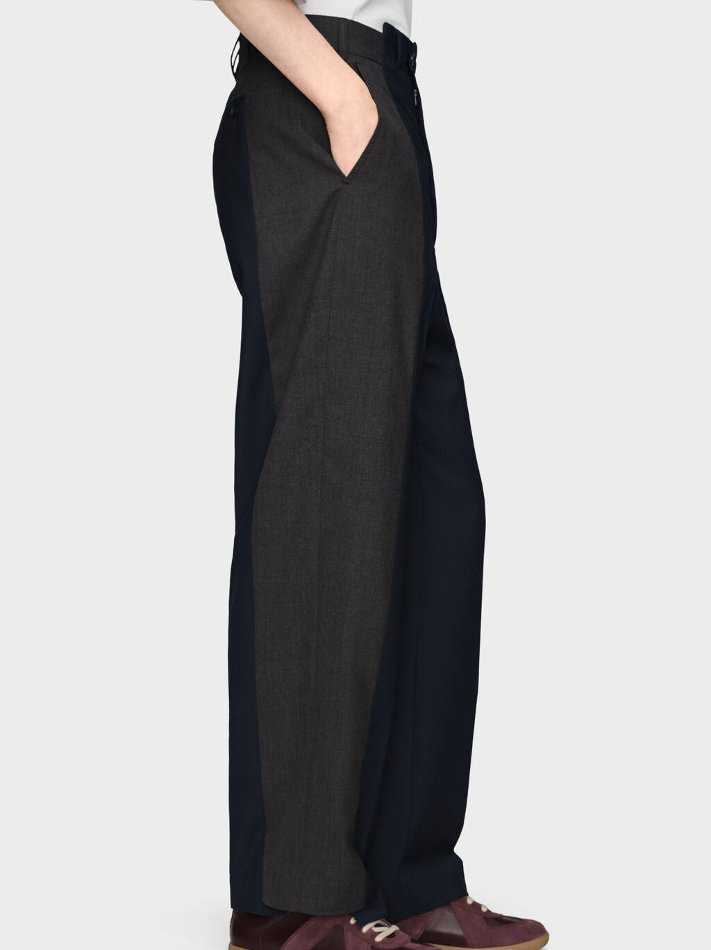 Side view of Maison Margiela Spliced Tailored Trousers in Dark Blue/Charcoal