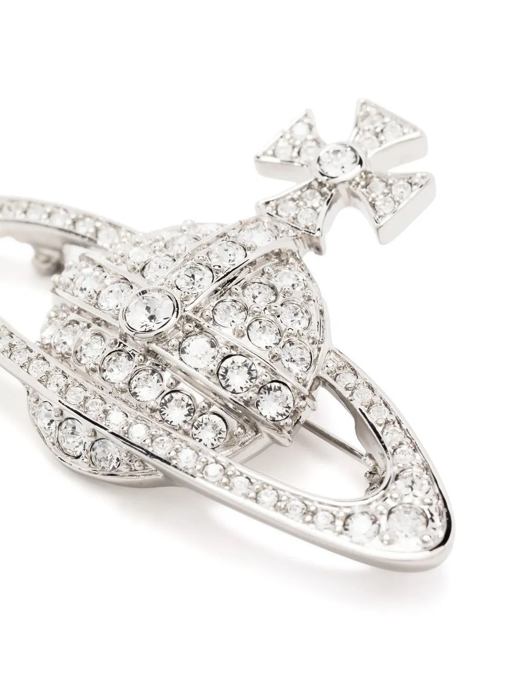 Diagonal closeup of Vivienne Westwood Bas Relief Brooch in platinum, highlighting pavé-set orb motif and polished silver-tone finish.