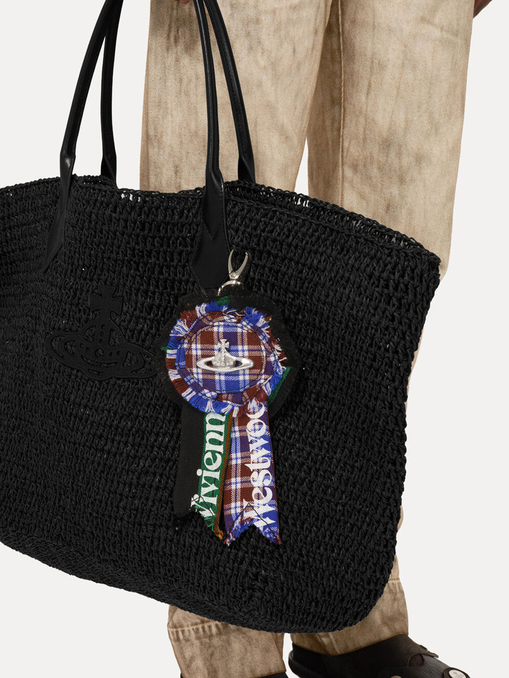 Vivienne Westwood Rosette Charm in Multicolour styled on a bag