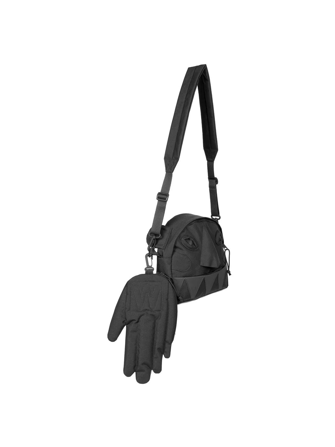 Walter Van Beirendonck x Eastpak Monster face pouch in Black configured as a crossbody bag with detachable hand-shaped pouch
