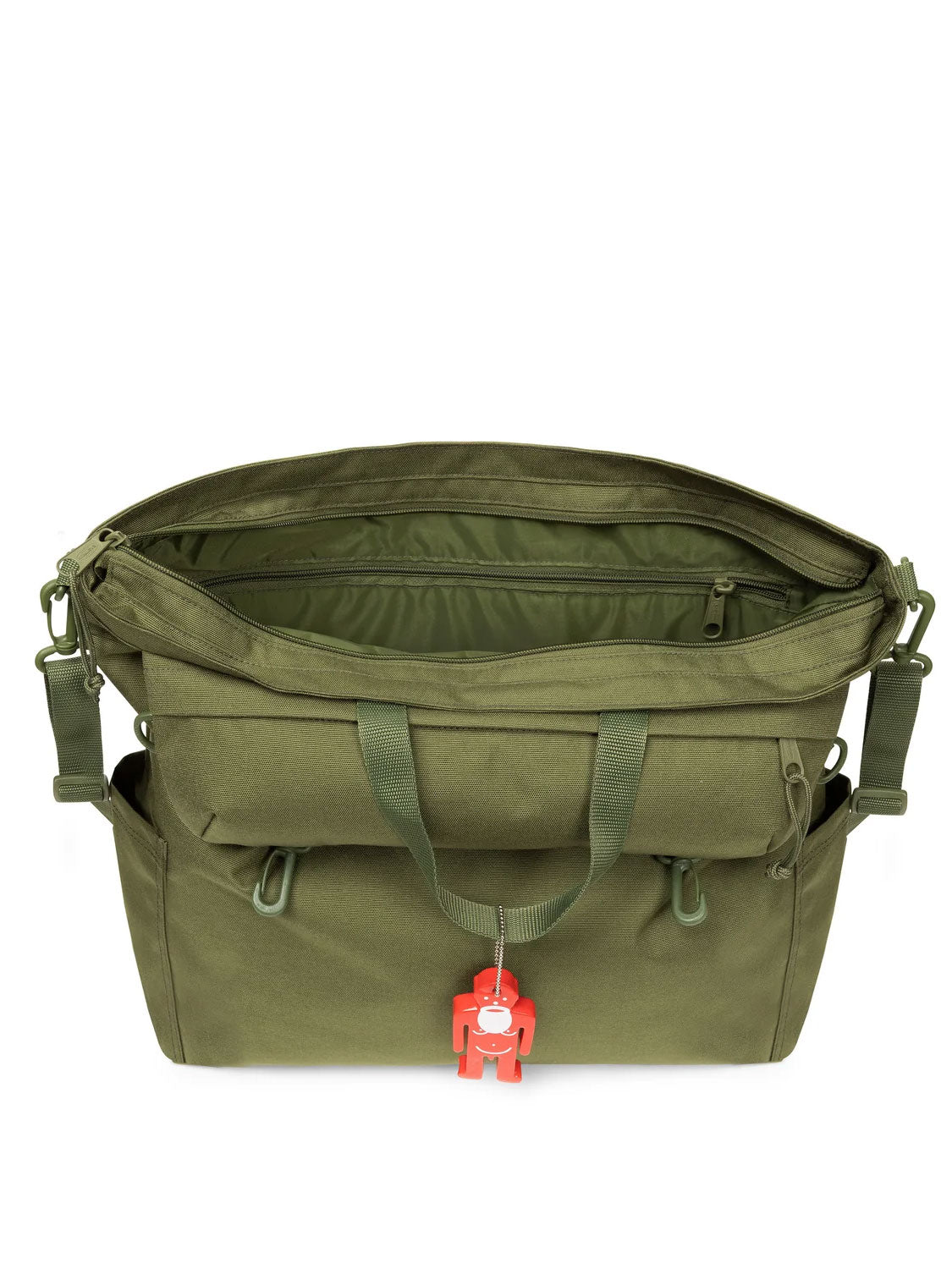 Walter Van Beirendonck x Eastpak Walter Carry Bag shown open from above with zip compartments, top handles and red Walterman charm