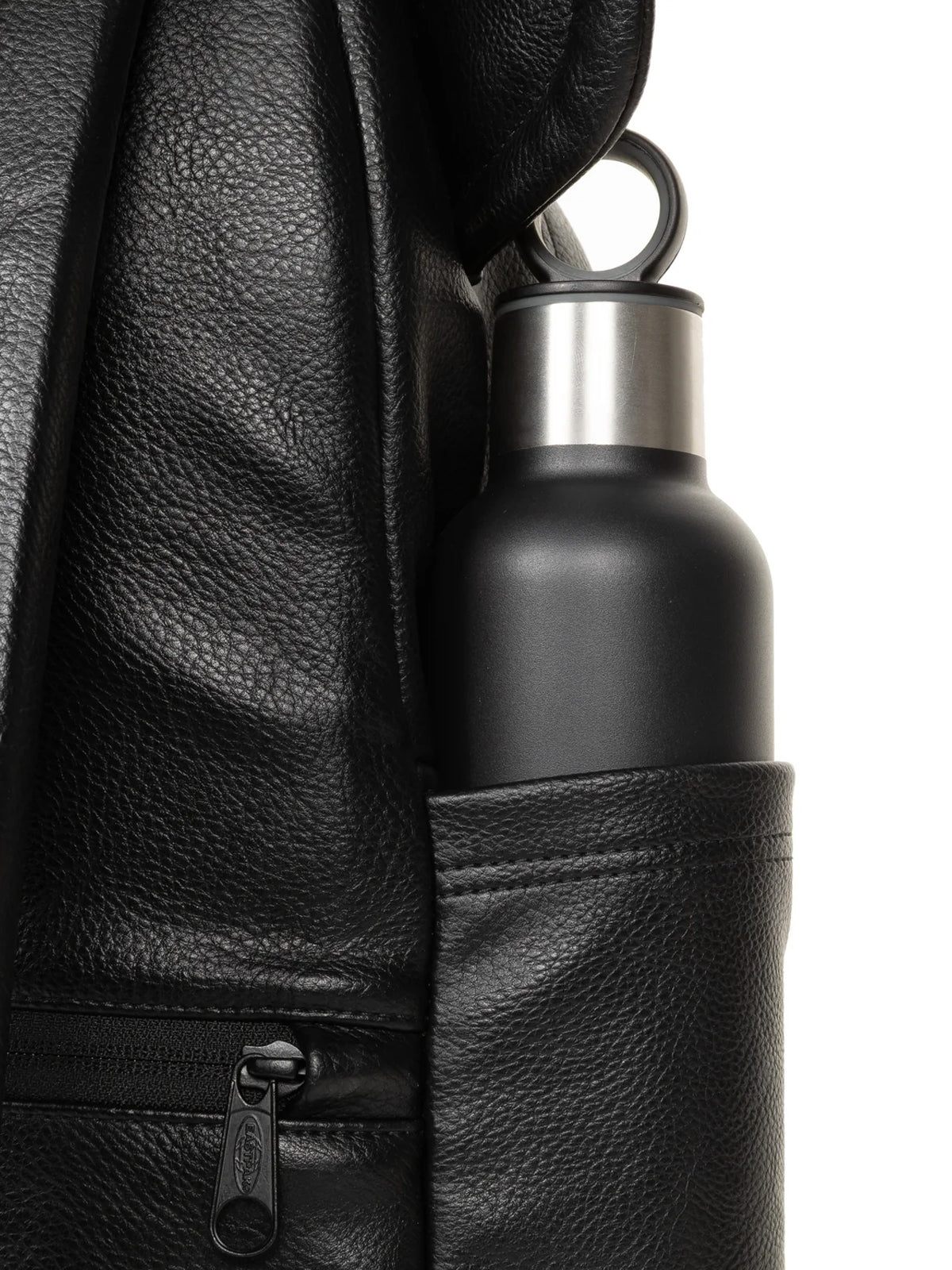 Walter Van Beirendonck Walter Pak'r in Black Faux Leather, side close-up showing the textured faux leather and bottle pocket.