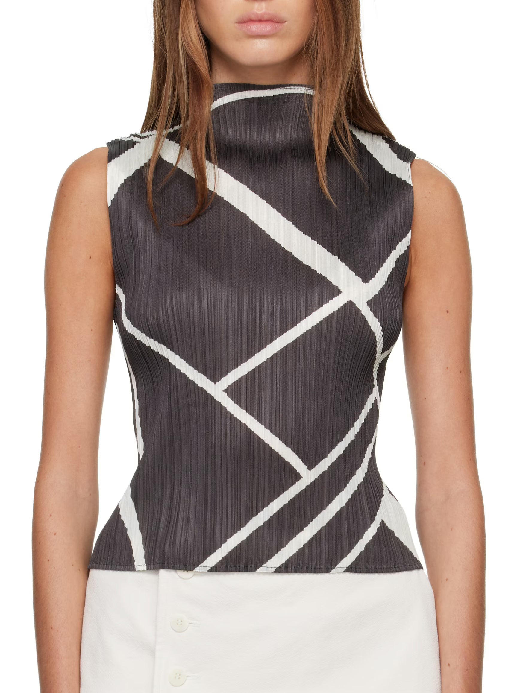 Pleats Please Issey Miyake Fold Line Shirt in Charcoal, worn view showing sleeveless pleated fit, mock neck and geometric fold line pattern